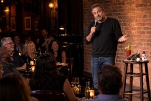A comedian performing humorous observations