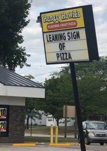 a sign on the side of a road